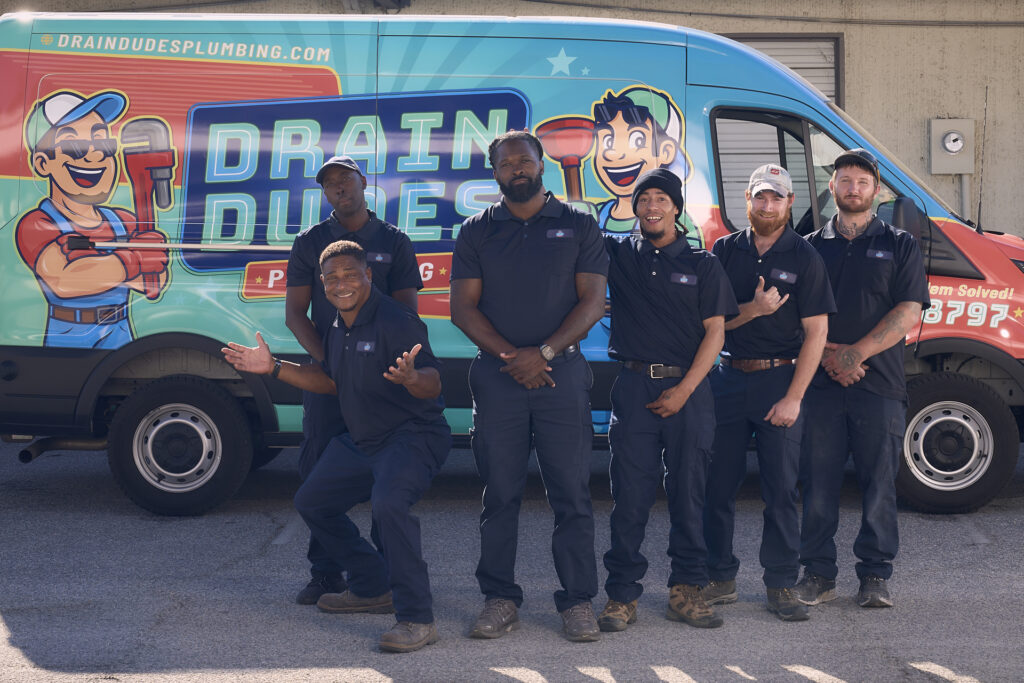 team members with the van 4