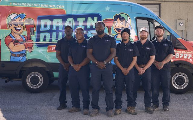 A Drain Dudes Team Photo team members with the van 5